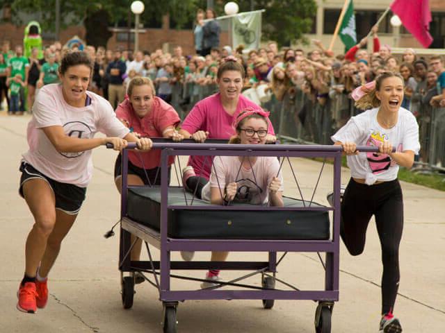 SBU students participating in bed races